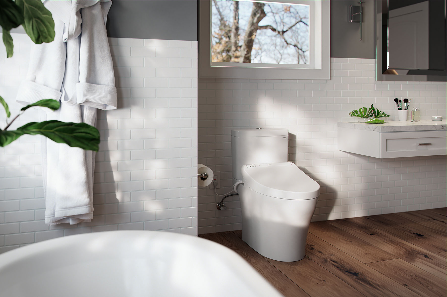 Modern bathroom featuring a TOTO K300 WASHLET bidet seat with Aquia IV toilet, white subway tiles, and wood flooring