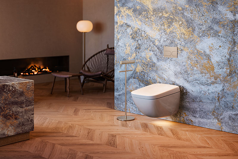 A NEOREST WX1 wall-hanging toilet is displayed in a warm bath setting.