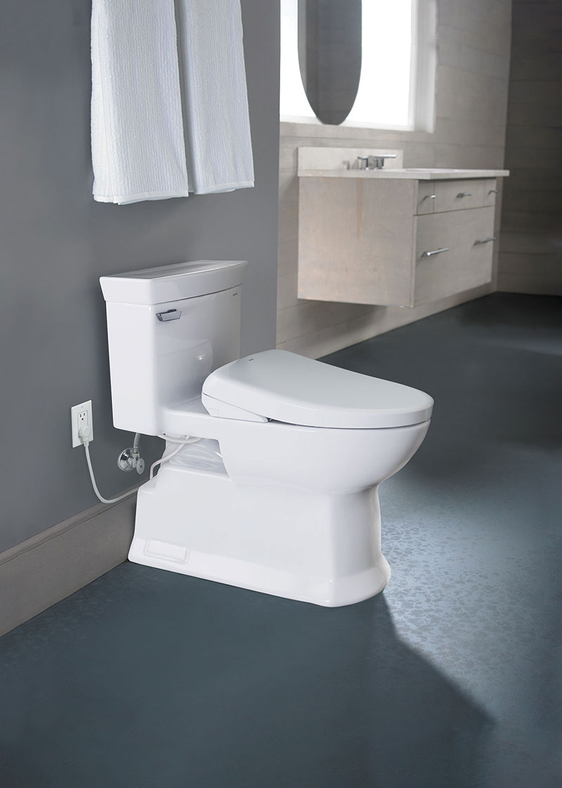 A modern bathroom featuring an eco-friendly TOTO WASHLET S7A electric bidet seat with advanced technology and a comfortable design.